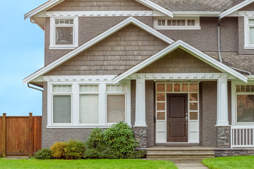Front view of residential home with newly installed windows